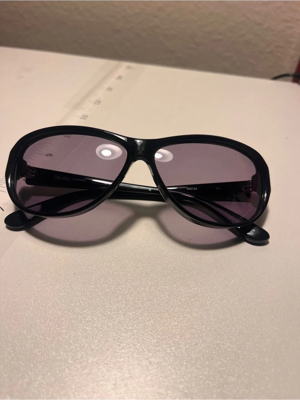 Stussy Black Frame Sunglasses with Purple Tinted Lenses